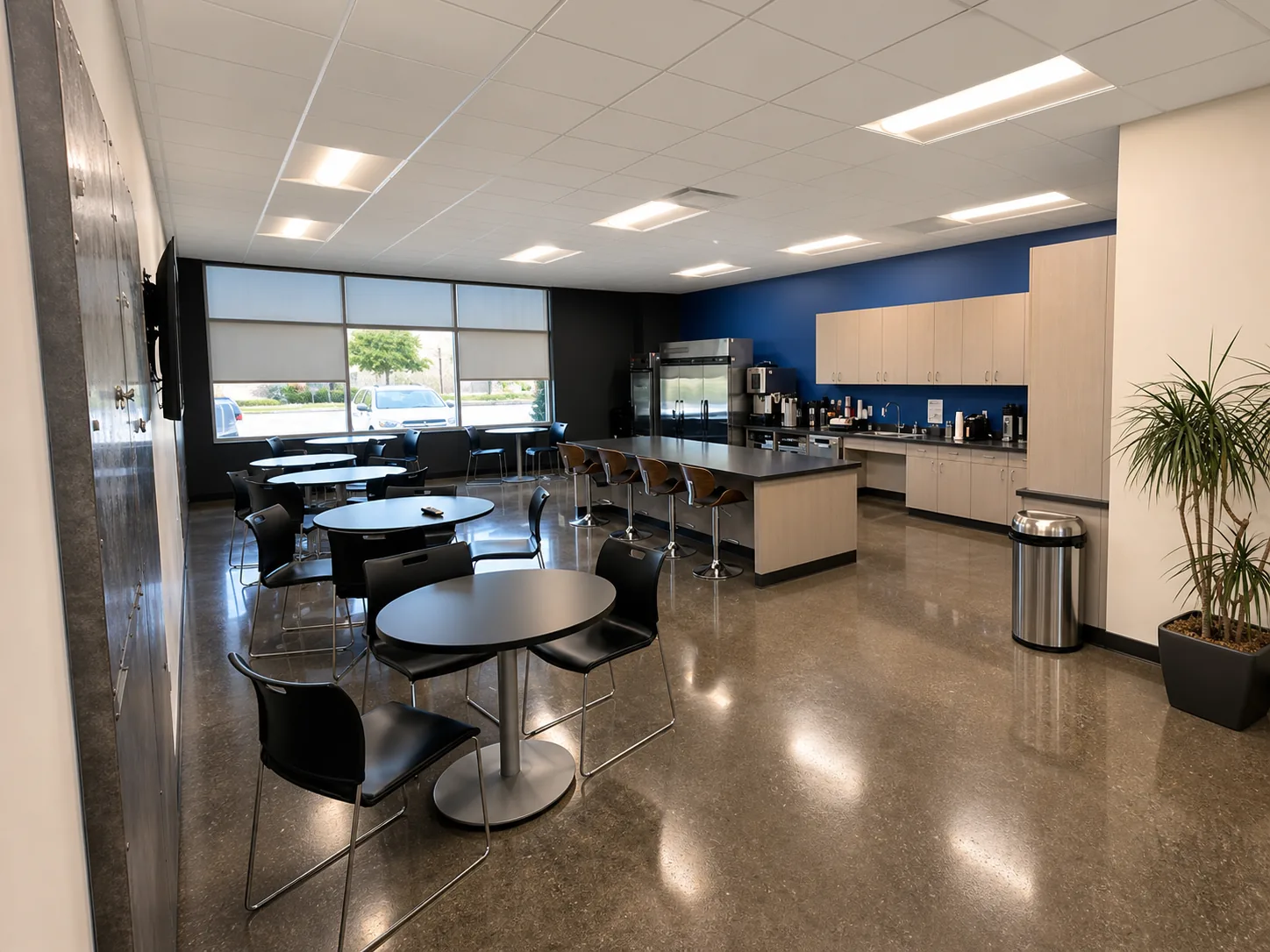 Full kitchen and break room with island seating